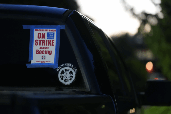 Thousands of Boeing employees involved in producing fighter jets and military weapons have walked off the job in a strike.